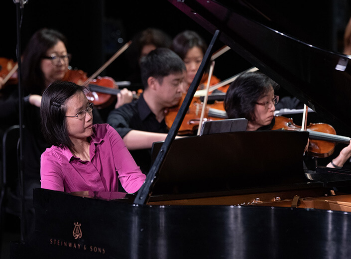 woman playing piano