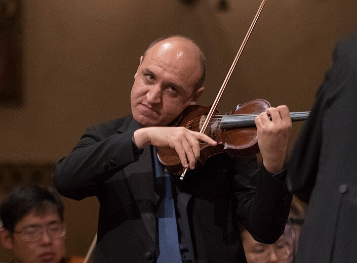 man playing violin