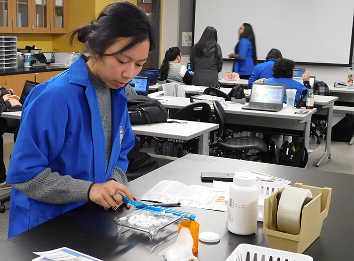 Pharm Tech student in lab.