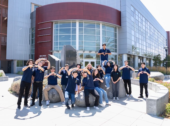 Welcome Center Ambassadors pose outside SEC building at Mission College.